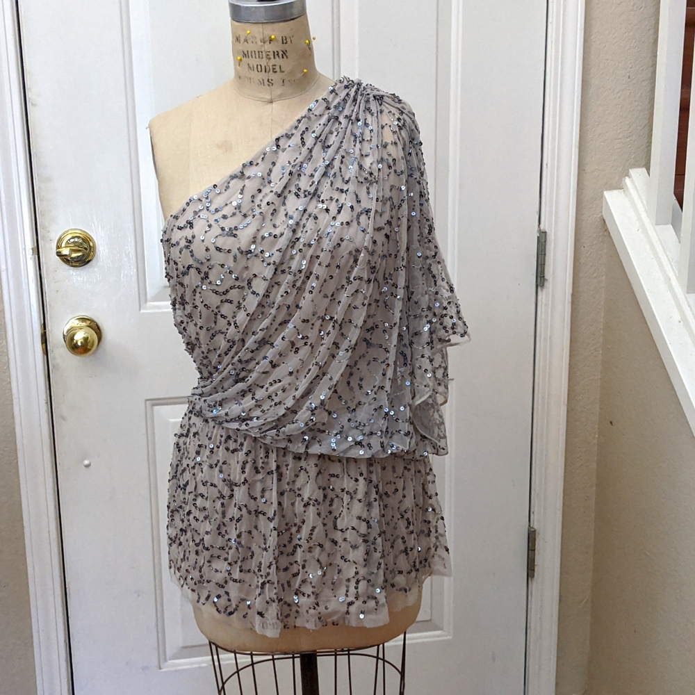 Asymmetrical sequined top
